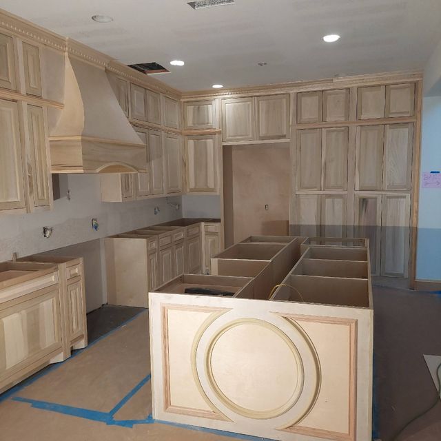 FIRST CLASS CUSTOM CABINETS(trim work,stairs. )